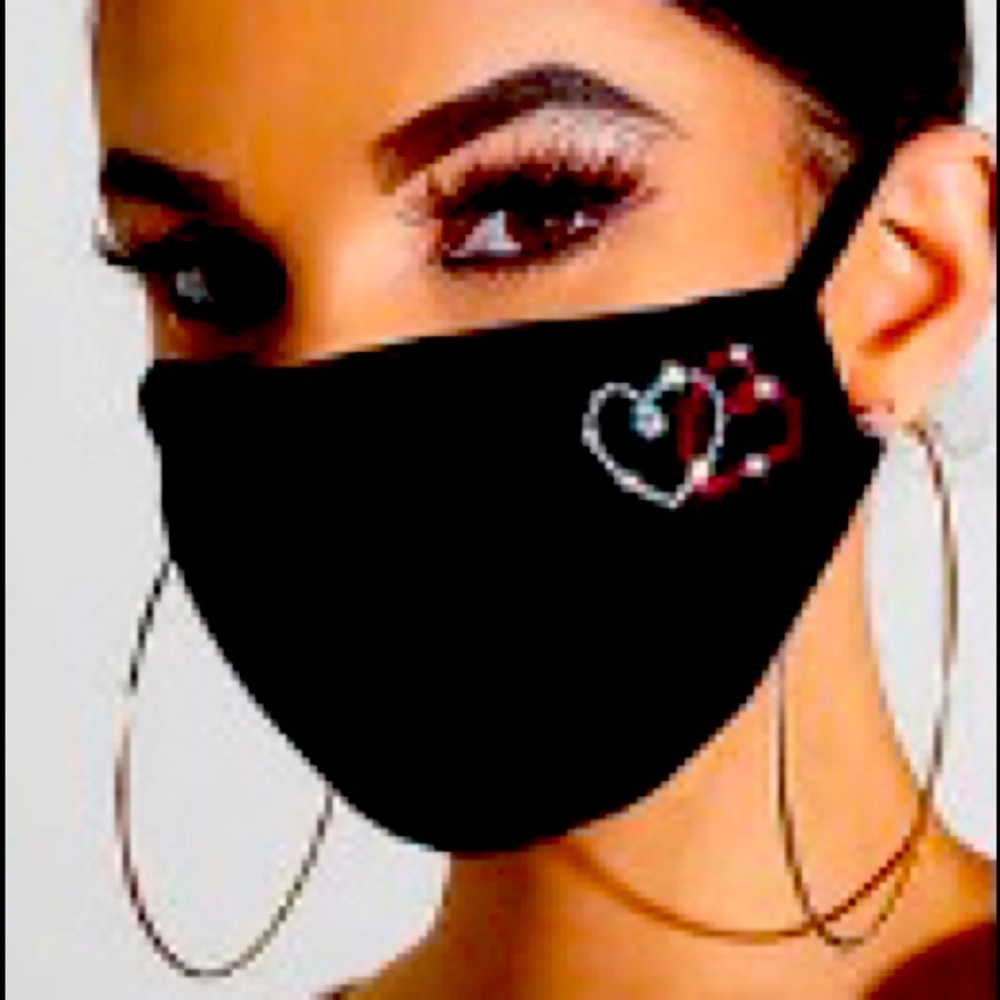 Super cute and brand new hearts face mask.